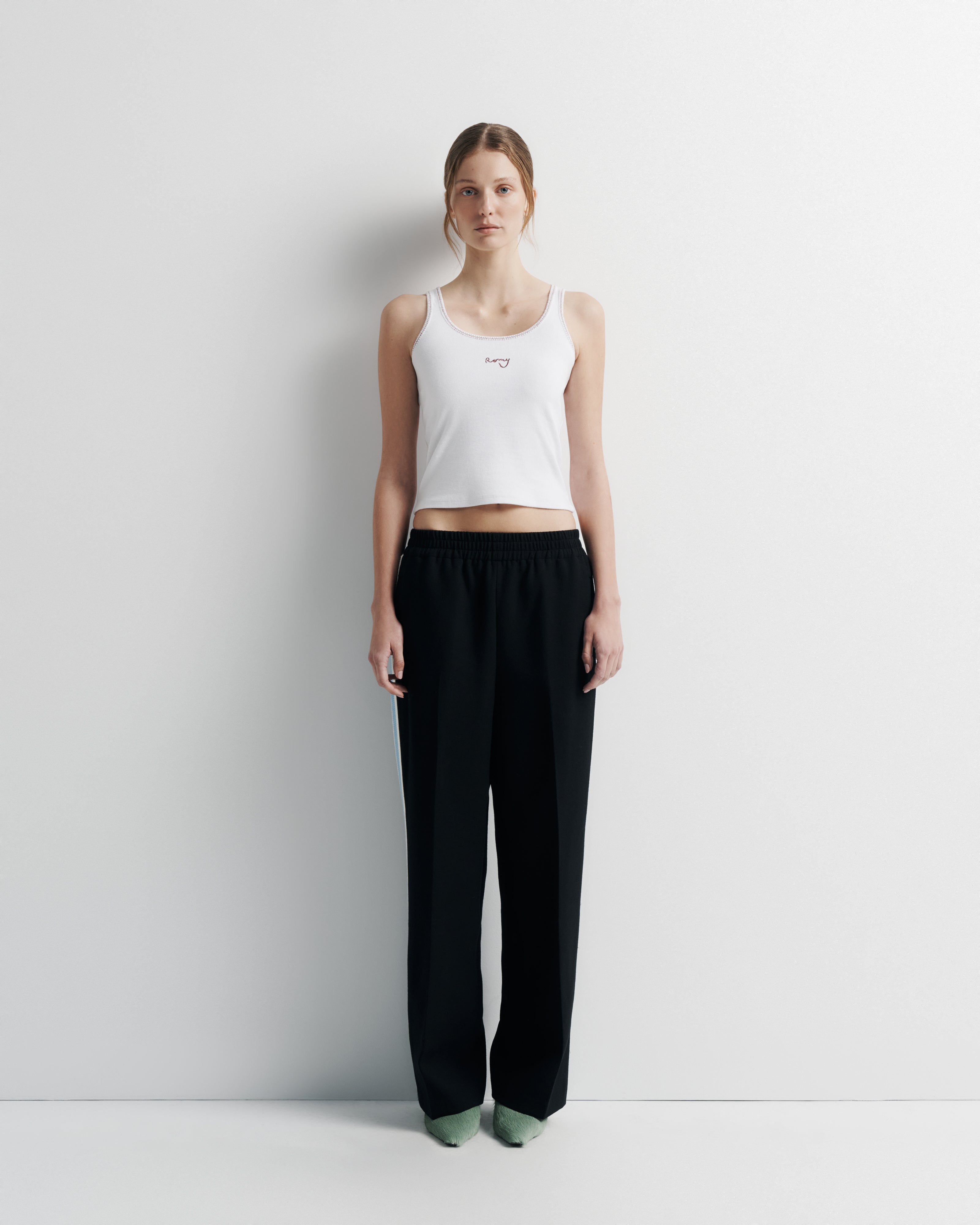 Willa Pant in black – wool track pant with elastic waist and crochet trim by Romy The Brand