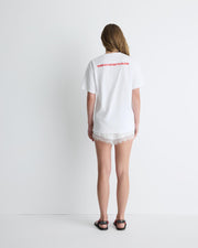 Kiss My Eyes To Sleep tee – white cotton boyfriend t-shirt with red heart graphic by Romy The Brand