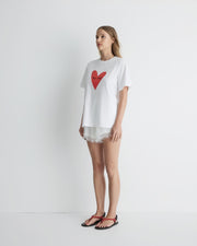 Kiss My Eyes To Sleep tee – white cotton boyfriend t-shirt with red heart graphic by Romy The Brand