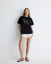 Cupid’s Heart tee in black – cotton boyfriend t-shirt with heart graphic by Romy The Brand