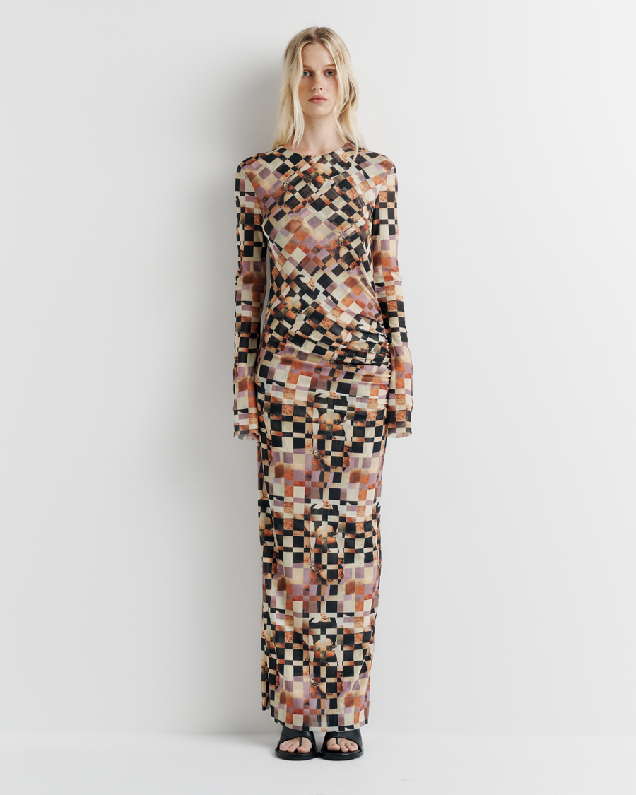 Model wearing the Clara Mesh Dress – long sleeve midi dress with fitted silhouette and delicate mesh fabric by ROMY.