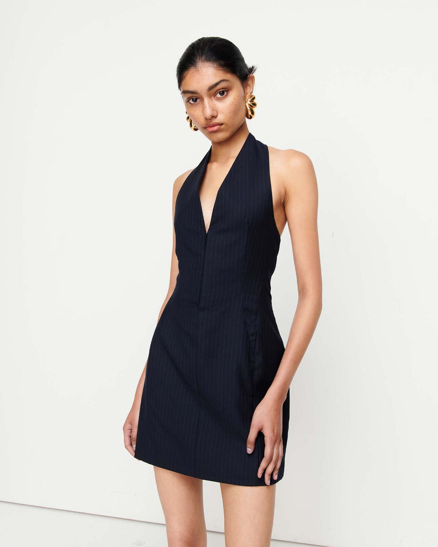 Discover the Jade Dress – a sophisticated halter neck design with expertly crafted panel lines for a sculpted fit. Featuring hip shaping to enhance natural curves, this elegant piece is perfect for any occasion.