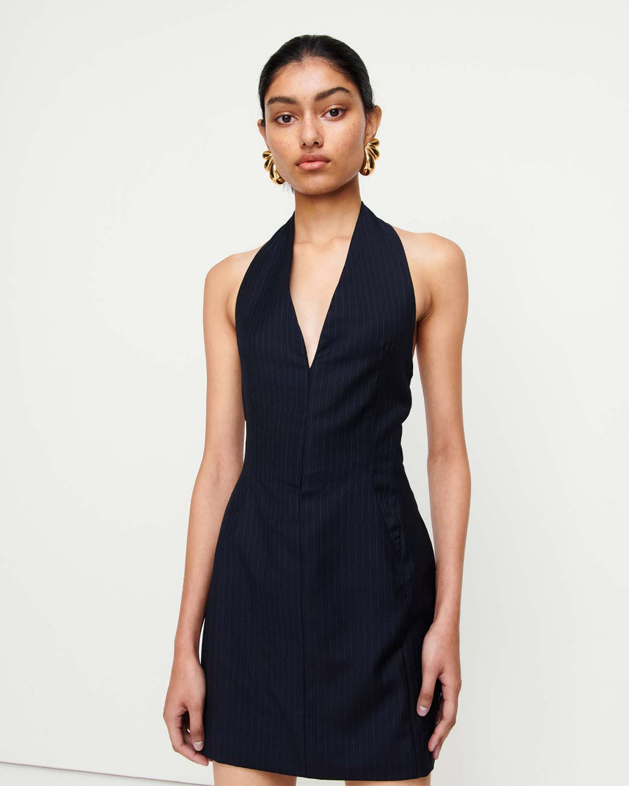 Discover the Jade Dress – a sophisticated halter neck design with expertly crafted panel lines for a sculpted fit. Featuring hip shaping to enhance natural curves, this elegant piece is perfect for any occasion.
