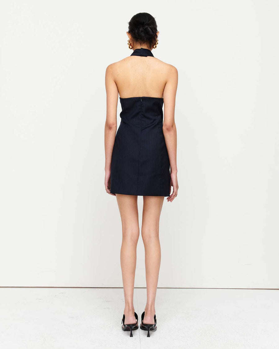 Discover the Jade Dress – a sophisticated halter neck design with expertly crafted panel lines for a sculpted fit. Featuring hip shaping to enhance natural curves, this elegant piece is perfect for any occasion.