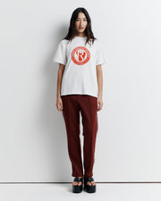 A classic crew neck boyfriend tee, the RAS Heritage Tee features a relaxed fit and is finished with the Romy Athletic Society heritage logo for a timeless, sporty touch.