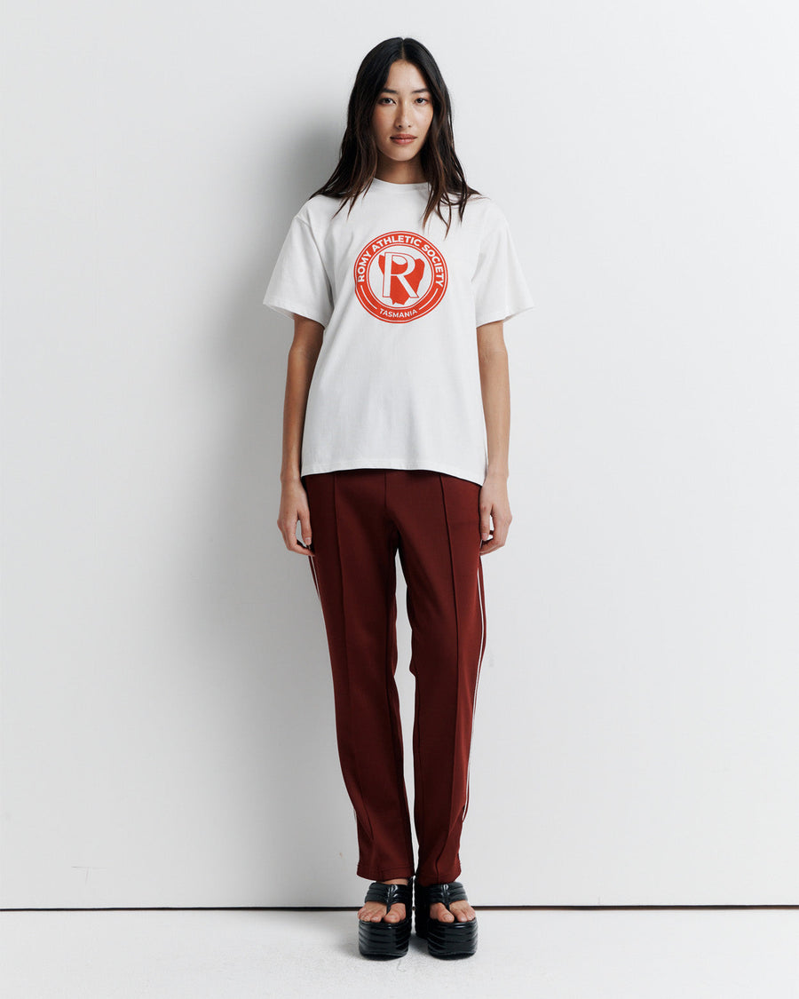 A classic crew neck boyfriend tee, the RAS Heritage Tee features a relaxed fit and is finished with the Romy Athletic Society heritage logo for a timeless, sporty touch.