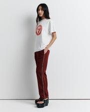 A classic crew neck boyfriend tee, the RAS Heritage Tee features a relaxed fit and is finished with the Romy Athletic Society heritage logo for a timeless, sporty touch.