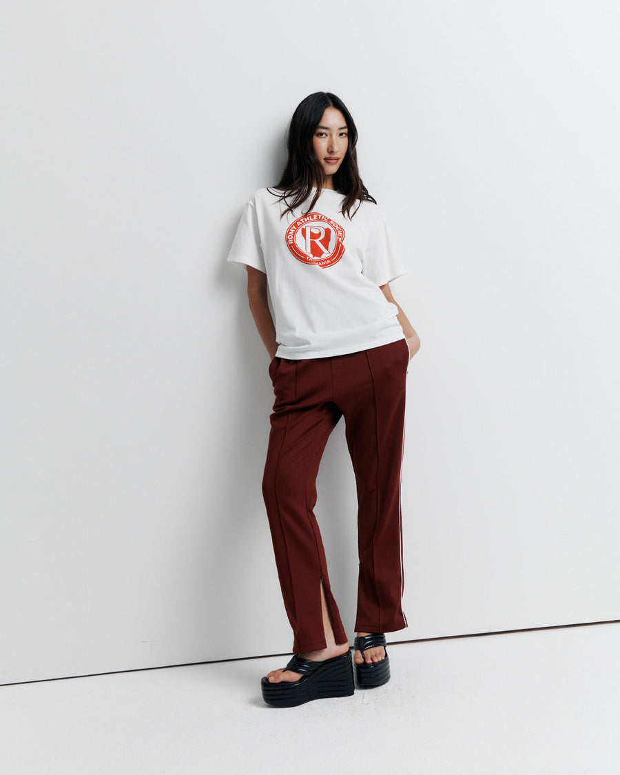 A classic crew neck boyfriend tee, the RAS Heritage Tee features a relaxed fit and is finished with the Romy Athletic Society heritage logo for a timeless, sporty touch.