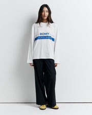 The RAS Long Sleeve Tee is a classic crew neck boyfriend tee with long sleeves, featuring the signature Romy Athletic Society logo for an effortlessly cool, sporty look.