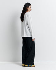 The RAS Long Sleeve Tee is a classic crew neck boyfriend tee with long sleeves, featuring the signature Romy Athletic Society logo for an effortlessly cool, sporty look.