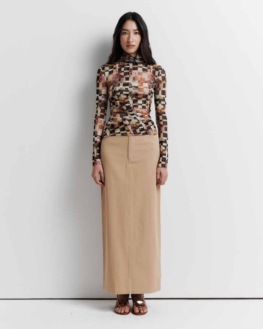 Model wearing the Blake Top – Mosaic Dreams print long sleeve blouse with soft drape and relaxed silhouette by ROMY.