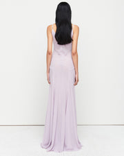 The Charlie Gown in Lilac is a reimagined Romy favorite, featuring a floor-length silhouette, adjustable straps, and a separate slip. Crafted from 100% polyester for effortless elegance and versatility.