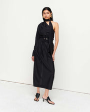 Make a statement in the Leo Top – a one-shoulder, long-sleeve design featuring an exaggerated neck tie and side splits for effortless elegance.