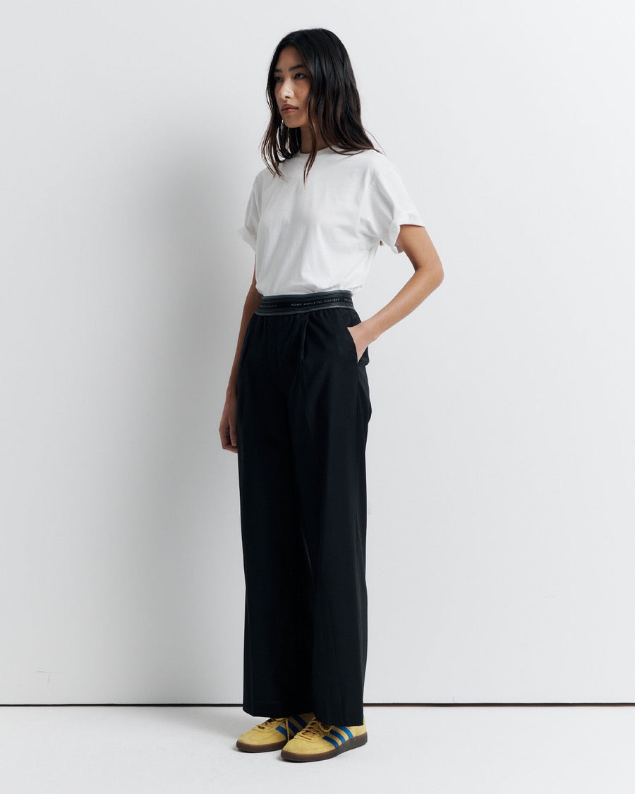 The RAS Pant by Romy Athletic Society combines everyday comfort with elevated style. Crafted from a luxurious wool blend, it features a sporty elastic waistband, side pockets, a faux fly, and a single welt back pocket.