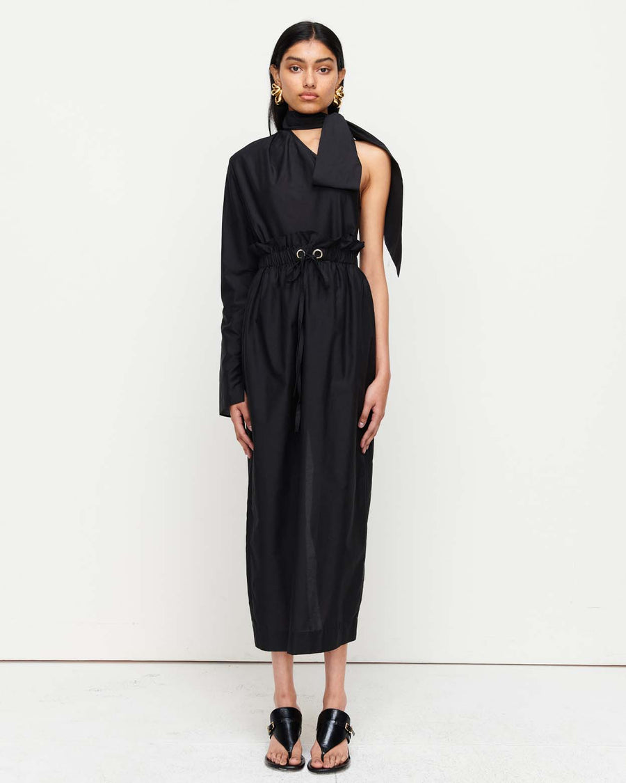 Elevate your wardrobe with the Milla Skirt – featuring a paper bag drawstring waist, a central rear vent, and a sleek calf-length silhouette with a straight hem.