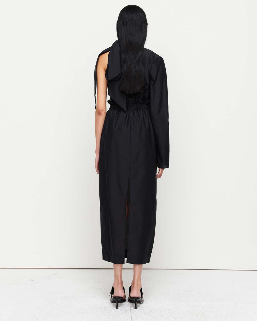 Elevate your wardrobe with the Milla Skirt – featuring a paper bag drawstring waist, a central rear vent, and a sleek calf-length silhouette with a straight hem.