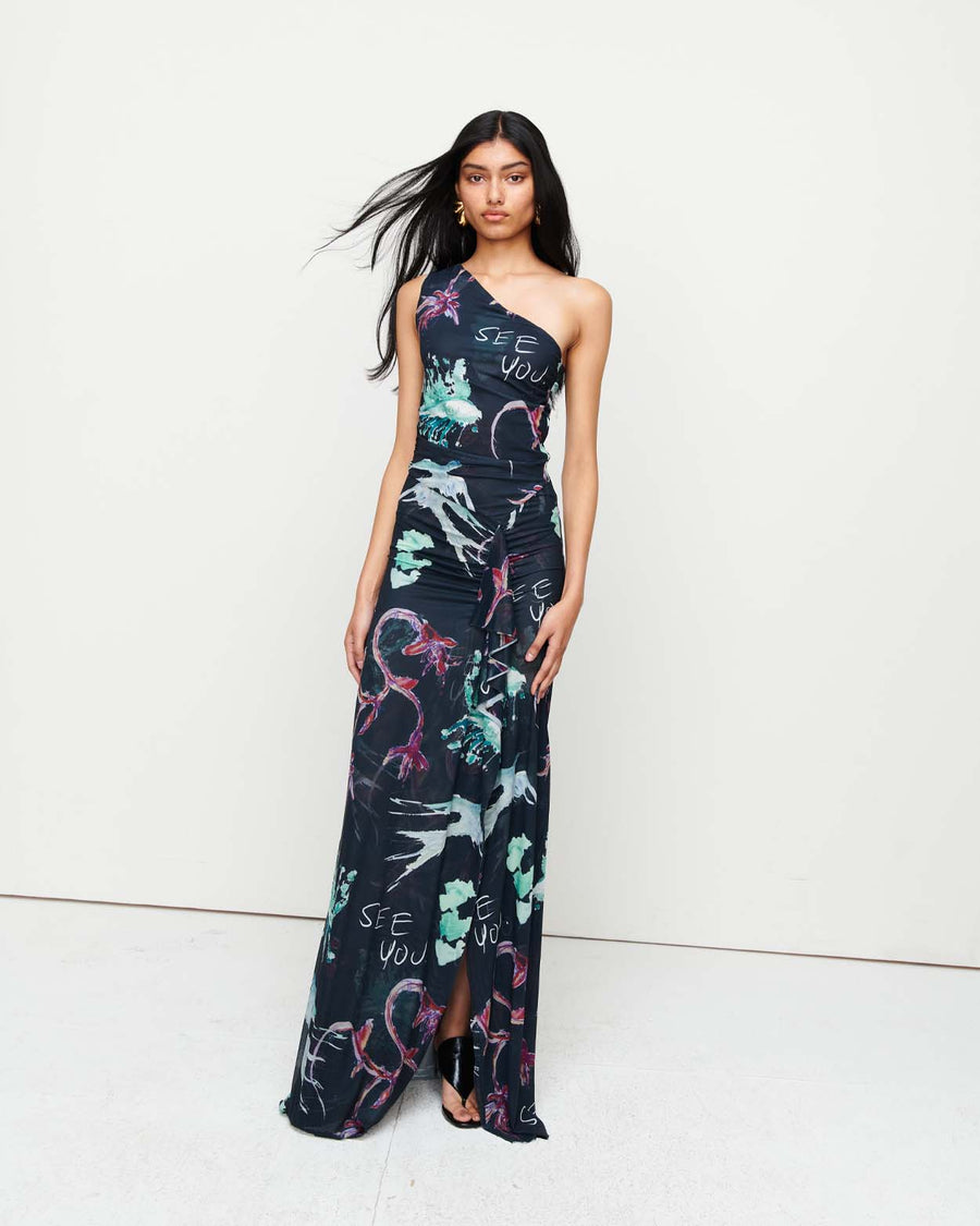 Turn heads in the Naomi Dress – a one-shoulder design featuring a cascading ruffle detail, thigh-high split, and a floor-length silhouette. Adorned with exclusive artwork by Anouk Colantoni.