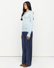 Elevate your wardrobe with the Louise Knit Top in Blue—a collared Henley-style design featuring soft gathers over the bust and elongated sleeves for effortless layering. Crafted from a luxe blend of Lyocell, acrylic, and wool, and finished with our signature ‘R’ embroidery.