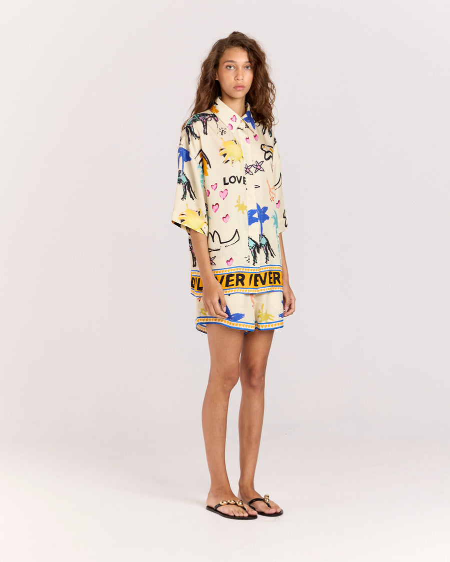 Experience effortless style with the Lover Shirt, featuring Jake Pedro's exclusive Lover Print. Crafted from a matte twill blend of viscose and recycled rayon, it drapes beautifully on the body with an oversized silhouette, relaxed shoulders, and a concealed placket for a sleek finish.