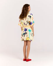 Elevate your style with the Lover Robe, a relaxed shirt-style mini dress featuring Jake Pedro's exclusive Lover Print. Crafted from matte viscose rayon twill, it includes a button front and a removable Romy belt tie for versatile styling.